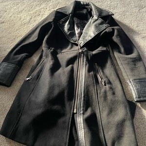 Ladies Guess black with leather on sleeves and color. Size s/p